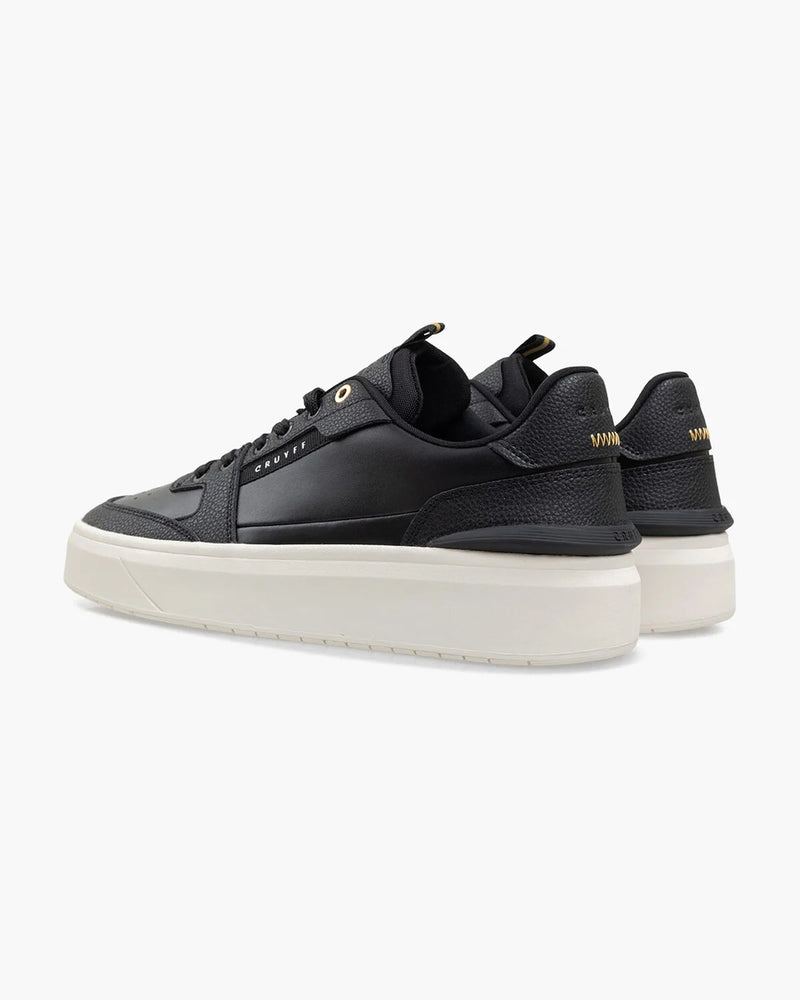 Cruyff Endorsed Tennis Soft leather in Black and Gold.